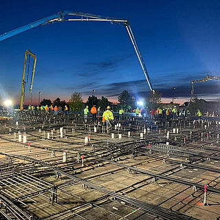 Our concrete pump truck helping pour a large commercial slab