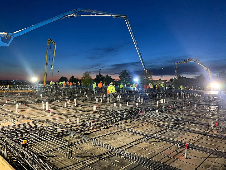 Our concrete pump truck helping pour a large commercial slab