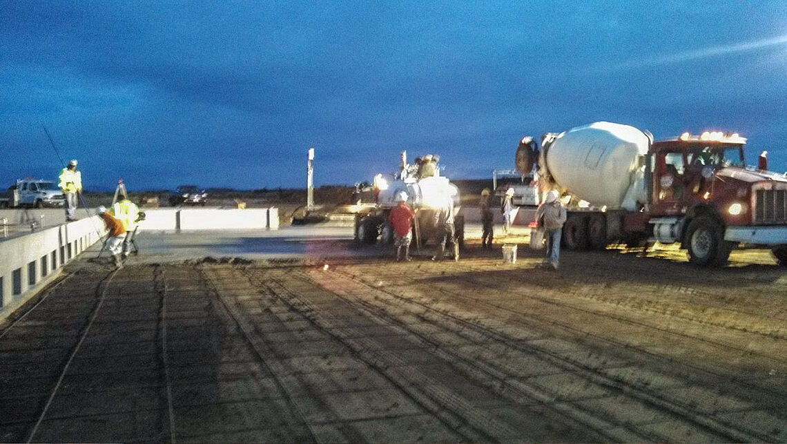 Large commercial concrete slab pour with concrete truck