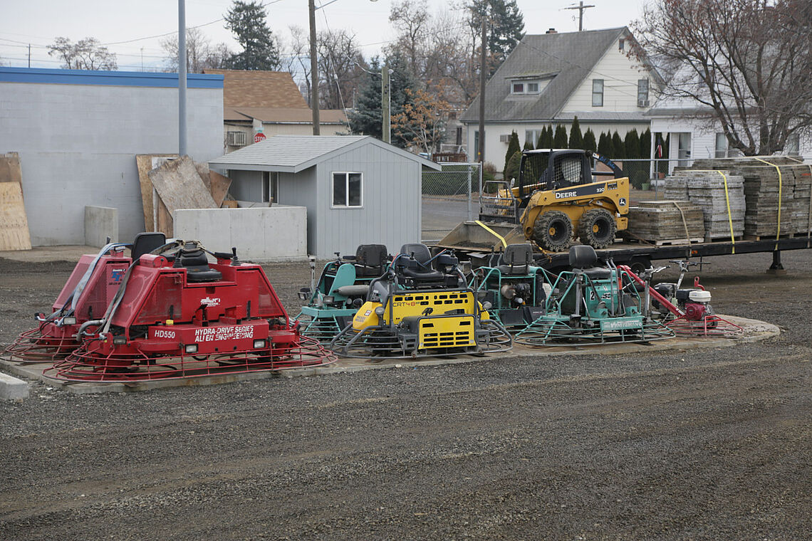 Ride-on concrete power trowels and laser trowels
